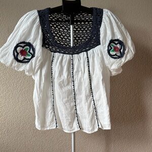 Cleobella White Peasant Top with Navy Crochet Neckline and Floral Embroidery